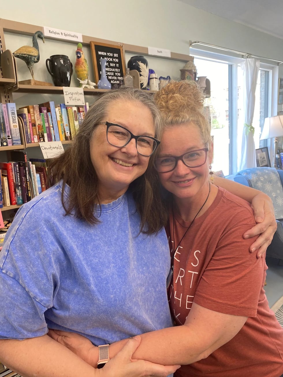 Sisters and former teachers Erin Lane (left) and Kael Welch at The Open Book, a nonprofit...