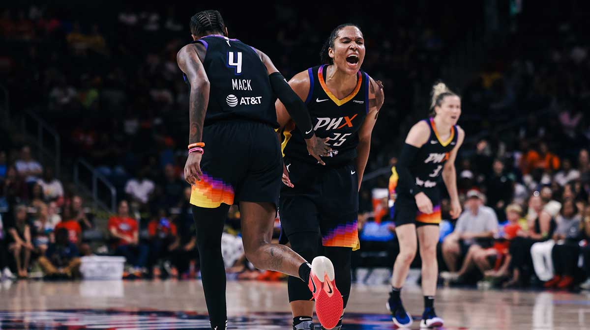 Phoenix Mercury forward Alyssa Thomas (25) reacts with forward Natasha Mack (4) after making a shot in the third quarter at CareFirst Arena.