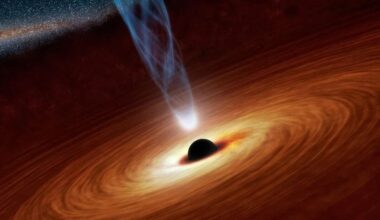 This artist's illustration shows a spinning SMBH at the center of its AGN. New research shows how AGN affect exoplanet habitability. The powerful energy can strip away atmospheres and ozone at great distances, shaping habitability in large portions of a galaxy. Image Credit: National Aeronautics and Space Administration / Jet Propulsion Laboratory-Caltech.