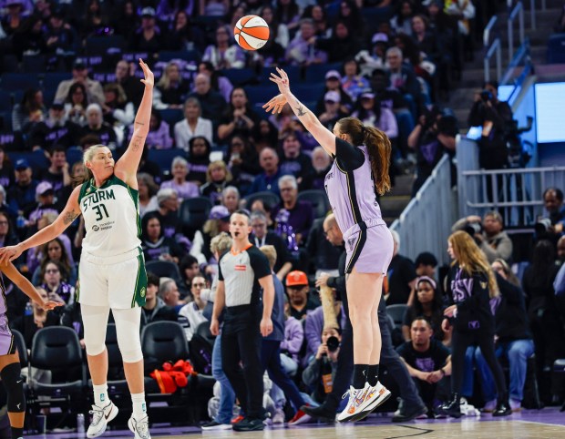 Golden State Valkyries' Marta Suarez (77) takes a shot against Seattle Storm's Stefanie Dolson (31) in the third quarter at Chase Center in San Francisco, Calif., on Saturday, April 25, 2026. (Shae Hammond/Bay Area News Group)