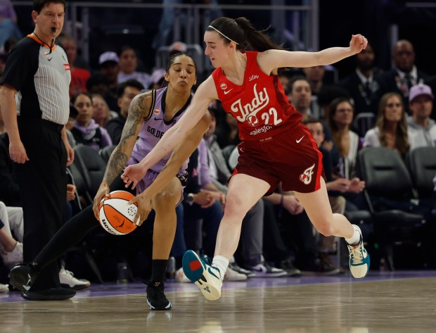 Indiana Fever's Caitlin Clark (22) reaches for the ball against Golden State Valkyries' Gabby Williams (1) in the second quarter at the Chase Center in San Francisco, Calif., on Thursday, May 28, 2026. (Nhat V. Meyer/Bay Area News Group)