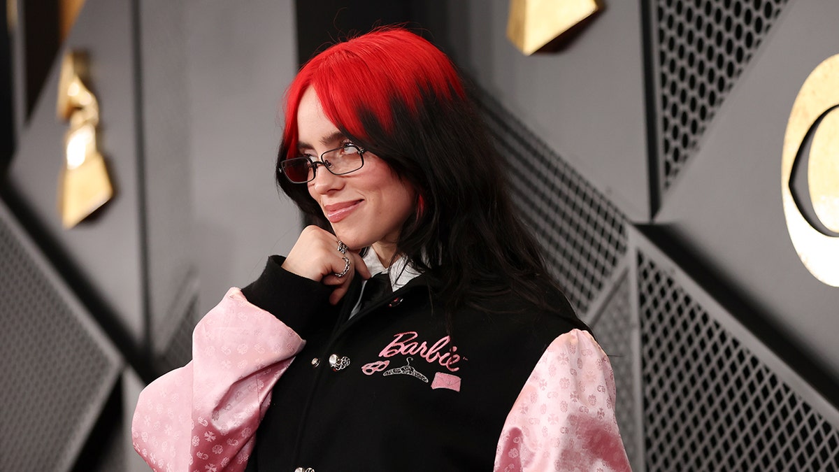 Billie Eilish walking the red carpet at the Grammys