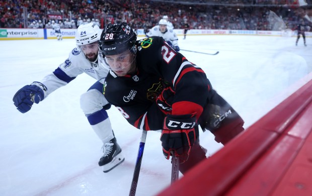 Blackhawks left wing André Burakovsky skates along the boards in the third period against the Lightning on Jan. 23, 2026, at the United Center. (Chris Sweda/Chicago Tribune)