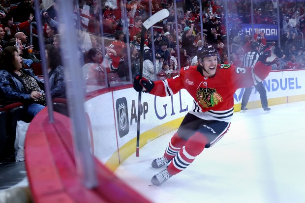 Blackhawks defenseman Ethan Del Mastro celebrates after scoring a goal in the third period against the Sharks on April 15, 2026, at the United Center. (Chris Sweda/Chicago Tribune)
