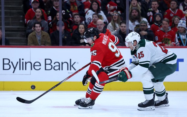 Blackhawks right wing Ilya Mikheyev tries to score in the third period against the Wild on Nov. 26, 2025, at the United Center. (Chris Sweda/Chicago Tribune)