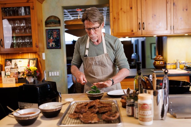 Celebrity chef and restaurateur Rick Bayless cooks at home for his YouTube channel, May 9, 2025, in Chicago. The Bayless Family Foundation made a $1 million donation to help fund the museum's $5 million West Wing renovation. (Armando L. Sanchez/Chicago Tribune)