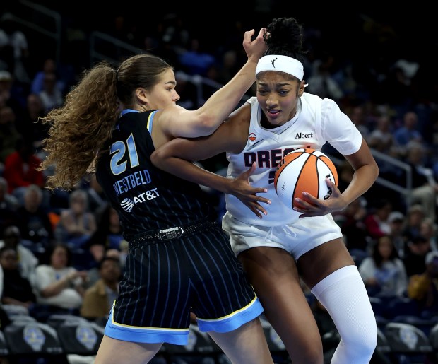 Dream forward Angel Reese puts a move on Sky forward Maddy Westbeld in a preseason game April 29, 2026, at Wintrust Arena. (Chris Sweda/Chicago Tribune)