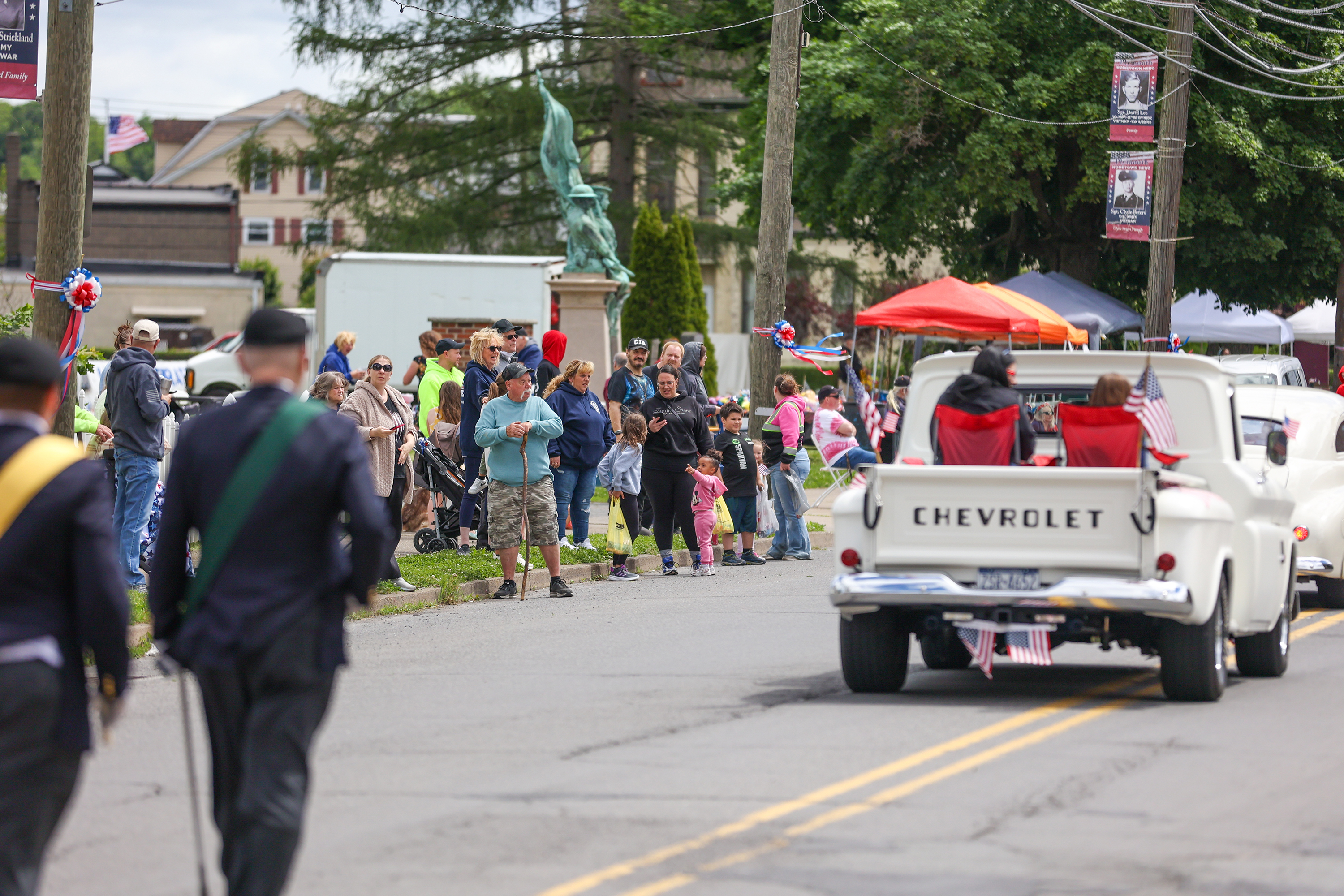 Attendees look on during a parade celebrating the 250th birthday...