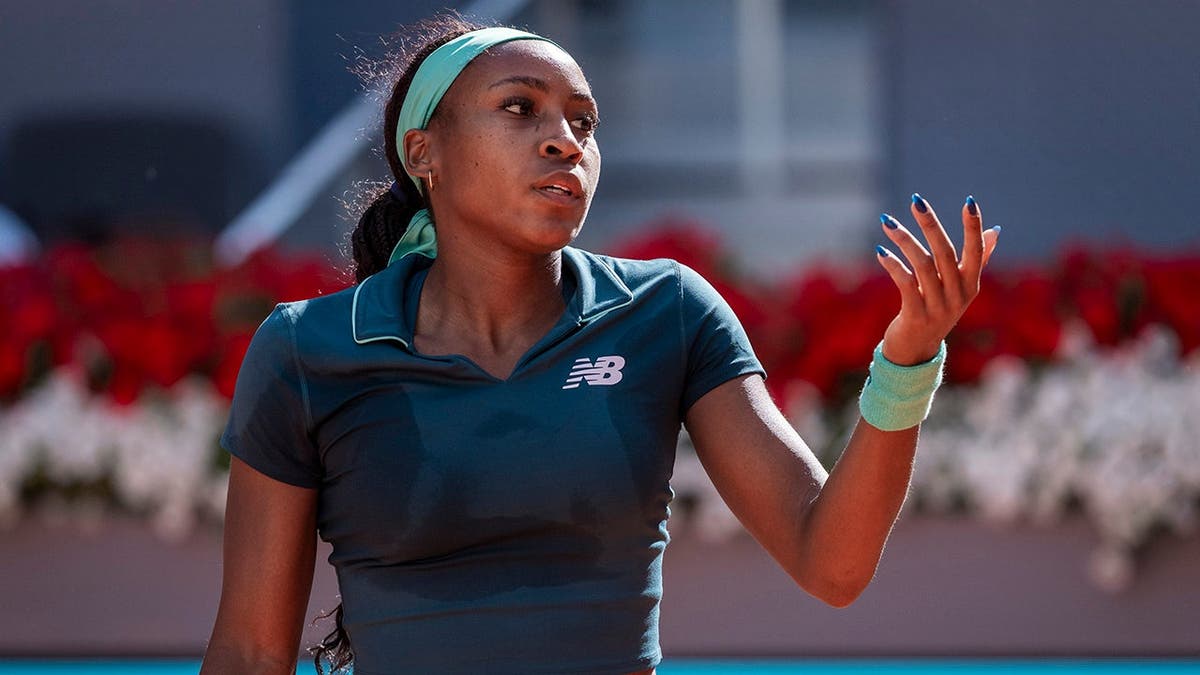 Coco Gauff reacting during a tennis match
