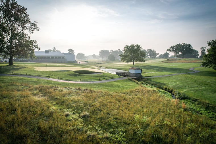 A view of the eighth green at Jeffersonville Golf Club in Norristown, with the newly renovated clubhouse in the background.
