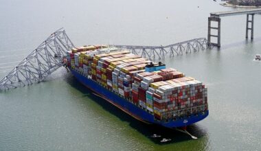 In this photo provided by the Maryland National Guard, the cargo ship Dali is stuck under part of the structure of the Francis Scott Key Bridge after the ship hit the bridge March 26, 2024, in Baltimore. (Maryland National Guard via AP, File)