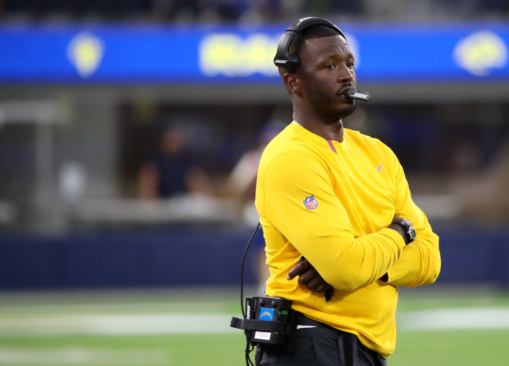 Special teams coordinator Derius Swinton II of the Los Angeles Chargers looks on before on during the preseason game against the Los Angeles Rams