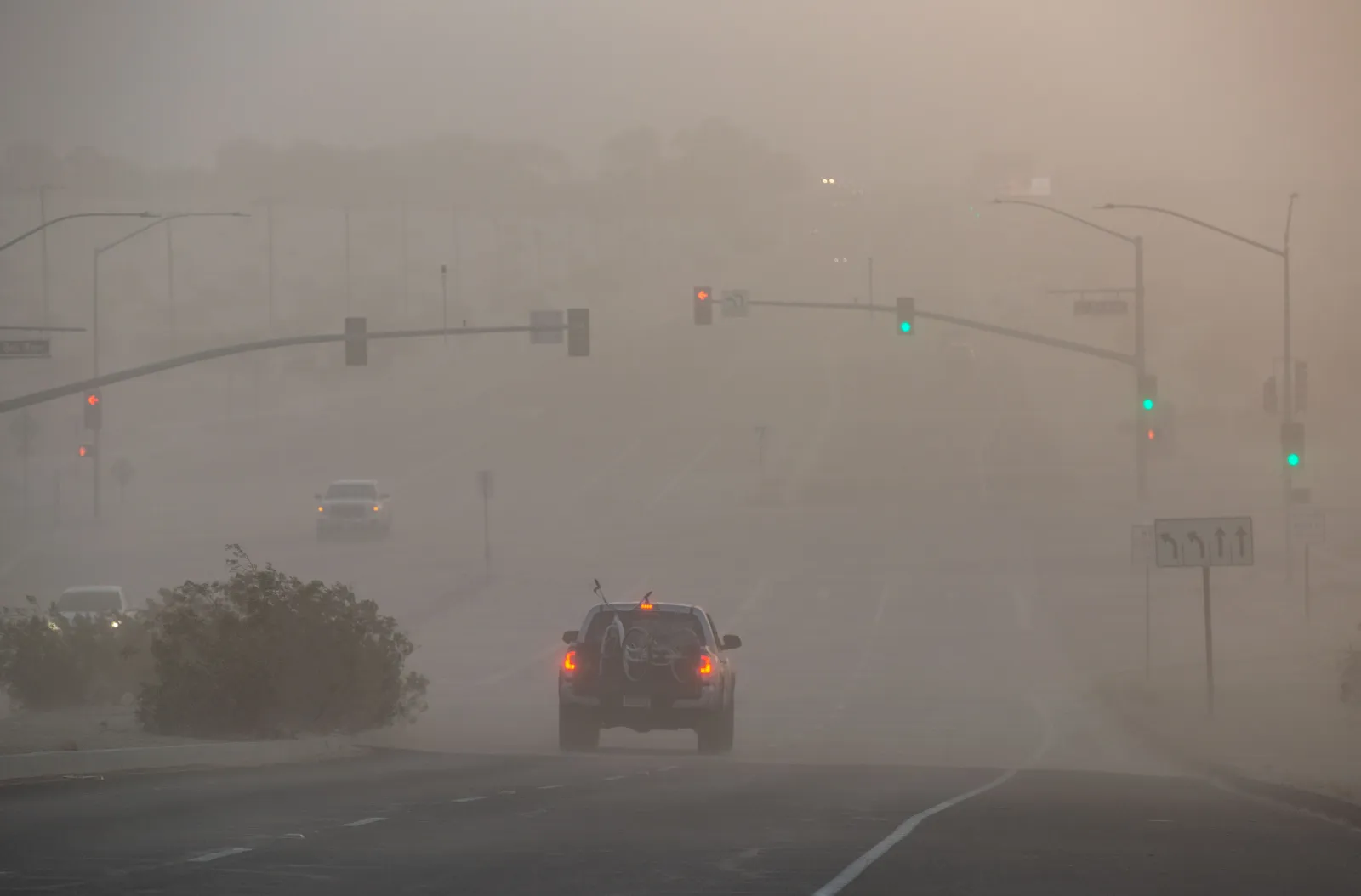 High winds and blowing sand drop the visibility to near zero during a storm in California's southern desert on May 8, 2022, in Cathedral City. An air quality alert is in place for parts of Imperial County on Tuesday and Wednesday because of windblown dust.