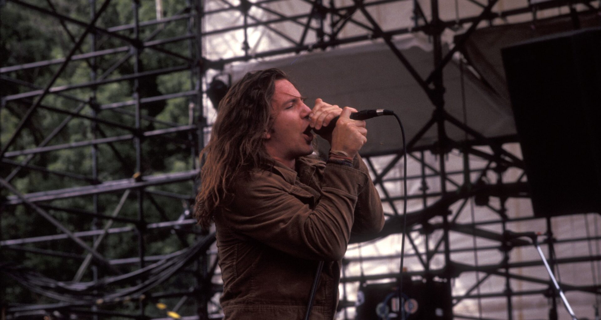 Musician Eddie Vedder of Pearl Jam performs at Lollapalooza 2 Music Festival on August 12, 1992 at Waterloo Village in Stanhope, New Jersey. (Photo by Ron Galella, Ltd./Ron Galella Collection via Getty Images)