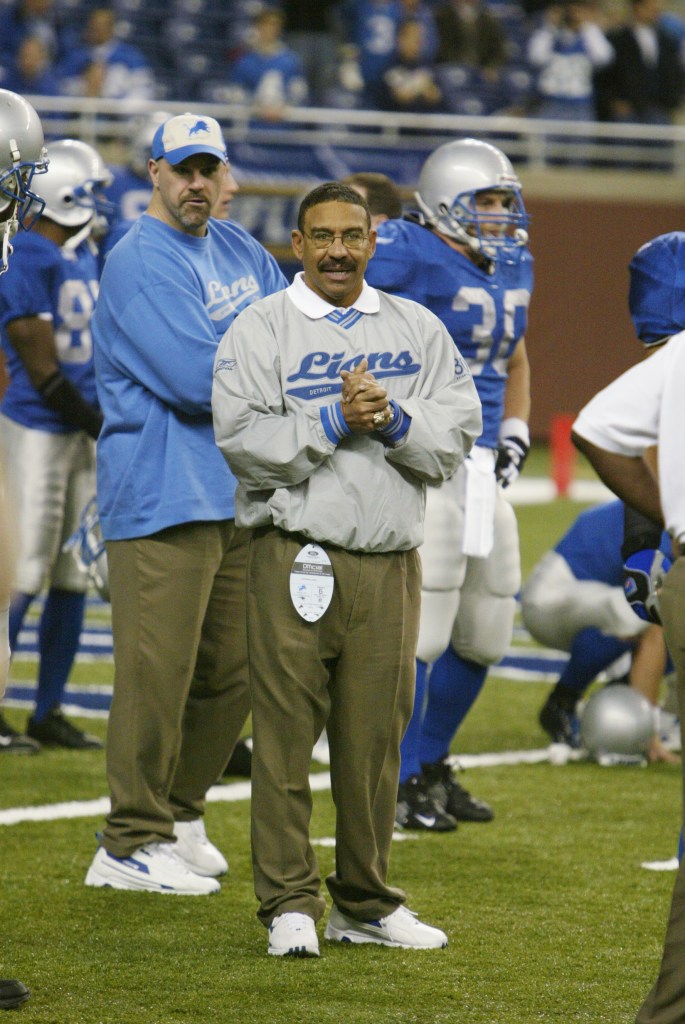 Special assistance-offense coach Sherman Lewis of the Detroit Lions watches his team play the New England Patriots on November 28, 2002 at Ford Field in Detroit, Michigan. The Patriots won 20-12. 