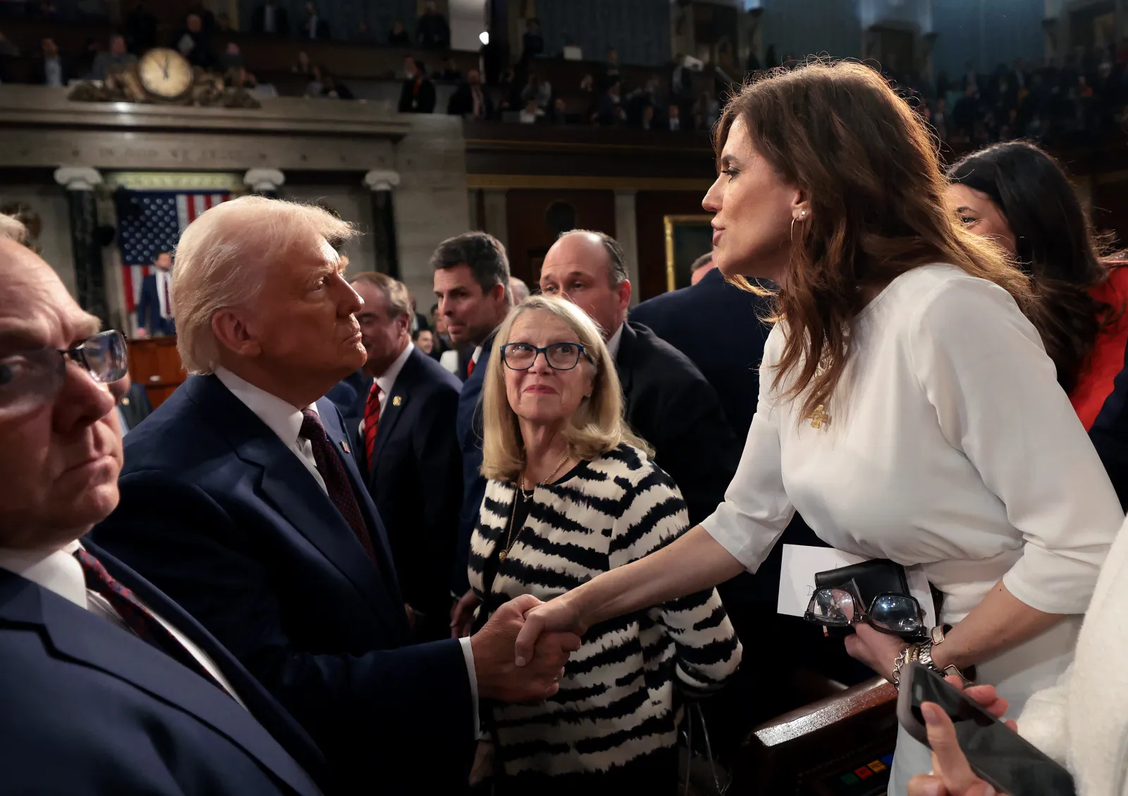 President Donald Trump shakes hands with U.S. Representative Nancy Mace as he exits after addressing a joint session of Congress at the U.S. Capitol in Washington, D.C., on March 4, 2025. (Photo by Win McNamee/Pool/AFP via Getty Images)