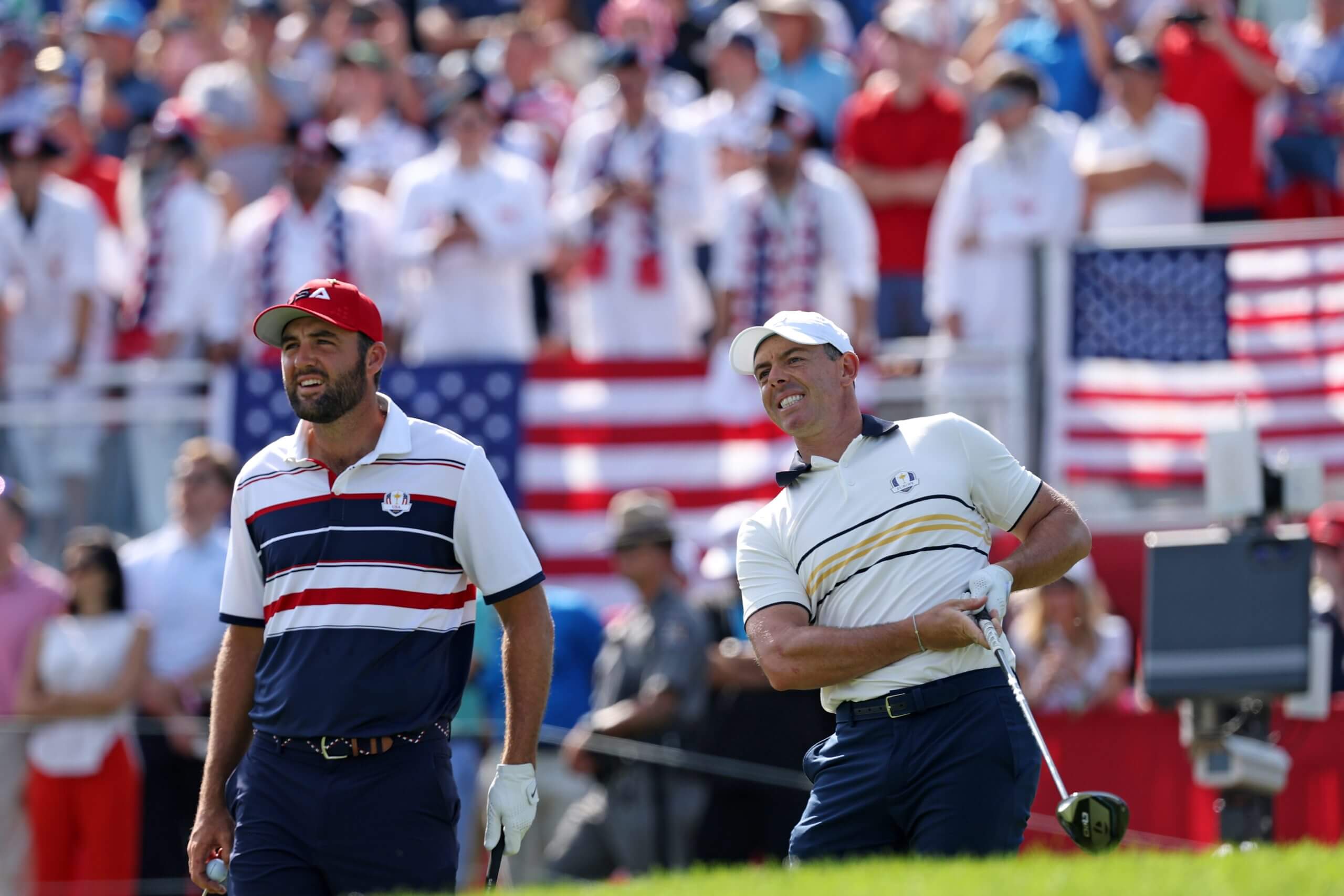Scottie Scheffler watches Rory McIlroy's tee shot at the 2025 Ryder Cup.