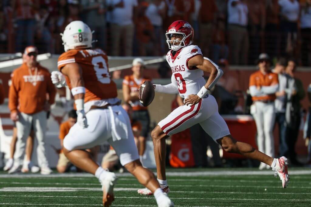 Quarterback Taylen Green scrambles for Arkansas during a 2025 game against Texas.
