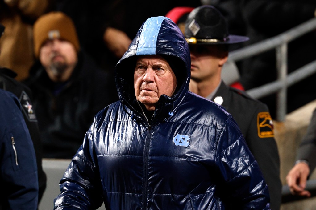 Head coach Bill Belichick of the North Carolina Tar Heels walks onto the field prior to the game against the NC State Wolfpack at Carter-Finley Stadium on November 29, 2025 in Raleigh, North Carolina.