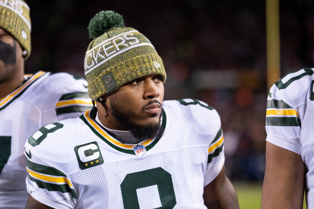 Josh Jacobs #8 of the Green Bay Packers looks on prior to an NFL wild card playoff game against the Chicago Bears at Soldier Field on January 10, 2026 in Chicago, Illinois. 