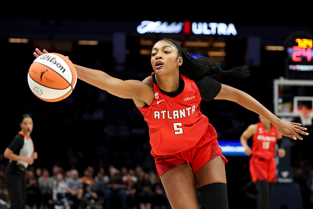 MINNEAPOLIS, MINNESOTA - MAY 09: Angel Reese #5 of the Atlanta Dream reaches for an errant ball during the first quarter against the Minnesota Lynx at Target Center on May 09, 2026 in Minneapolis, Minnesota. NOTE TO USER: User expressly acknowledges and agrees that, by downloading and or using this photograph, User is consenting to the terms and conditions of the Getty Images License Agreement. (Photo by Ellen Schmidt/Getty Images)
