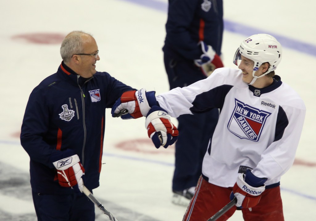  Assistant Coach Benoit Allaire and Jesper Fast #12 mess around during a practice session on an off day during the 2014 NHL Stanley Cup playoffs at Staples Center on June 6, 2014 in Los Angeles, California.  