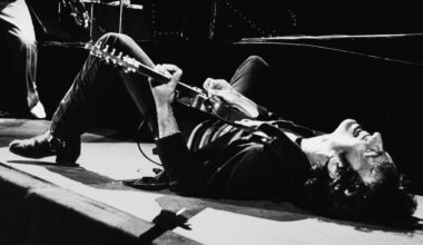 LOS ANGELES, CA - July 5: Rock and roll icon Bruce Springsteen falls to the stage and continues playing the guitar on his back on July 5, 1978 at the Forum in Inglewood, California. (Photo by George Rose/Getty Images)