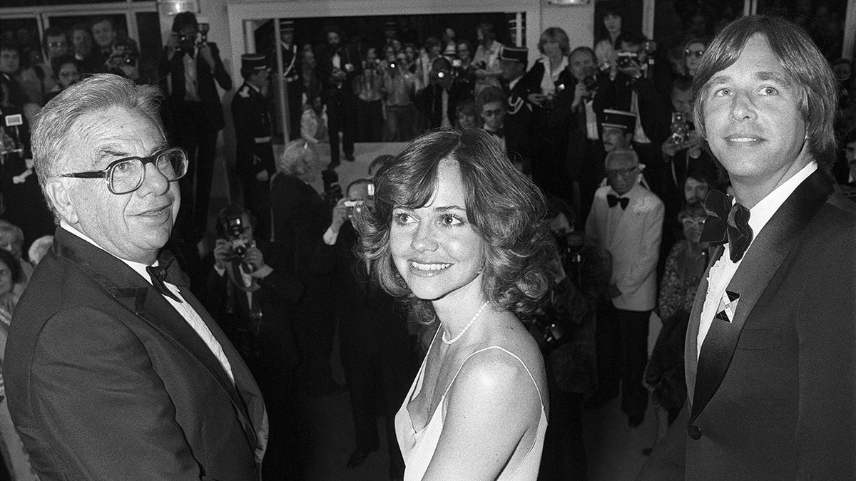 Martin Ritt standing with Sally Field and Beau Bridges at Cannes Film Festival