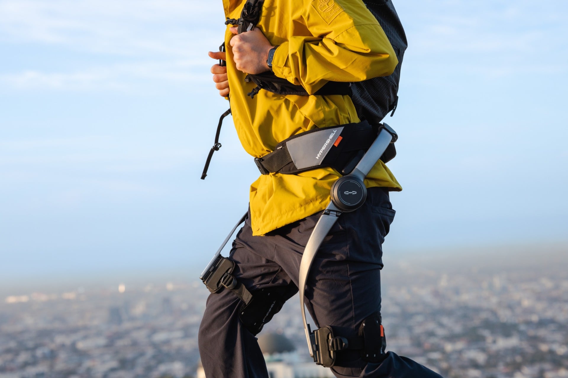 Hypershell X Ultra S worn on a person with a yellow jacket.