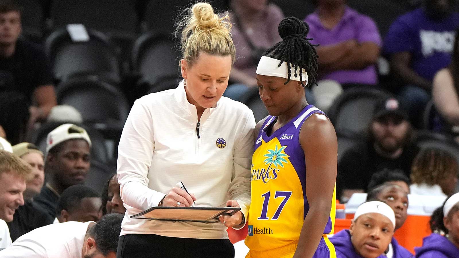 Los Angeles Sparks head coach Lynne Roberts talks to guard Erica Wheeler (17) in the second half against the Phoenix Mercury at Mortgage Matchup Center.