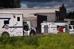 United States Environmental Protection Agency crews work on the scene across the street from the Nippon Dynawave Packaging Co. on May 27, 2026.
