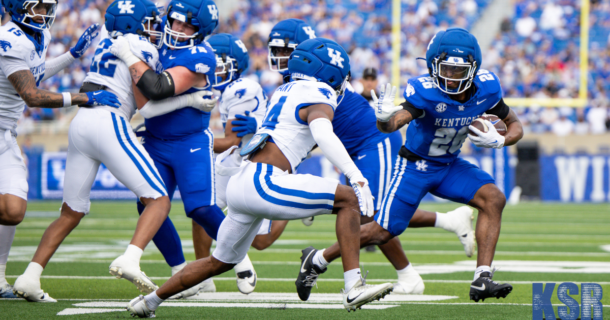 Jason Patterson gives Ty Bryant a stiff arm at the Kentucky Spring Game, via Crawford Ifland, KSR
