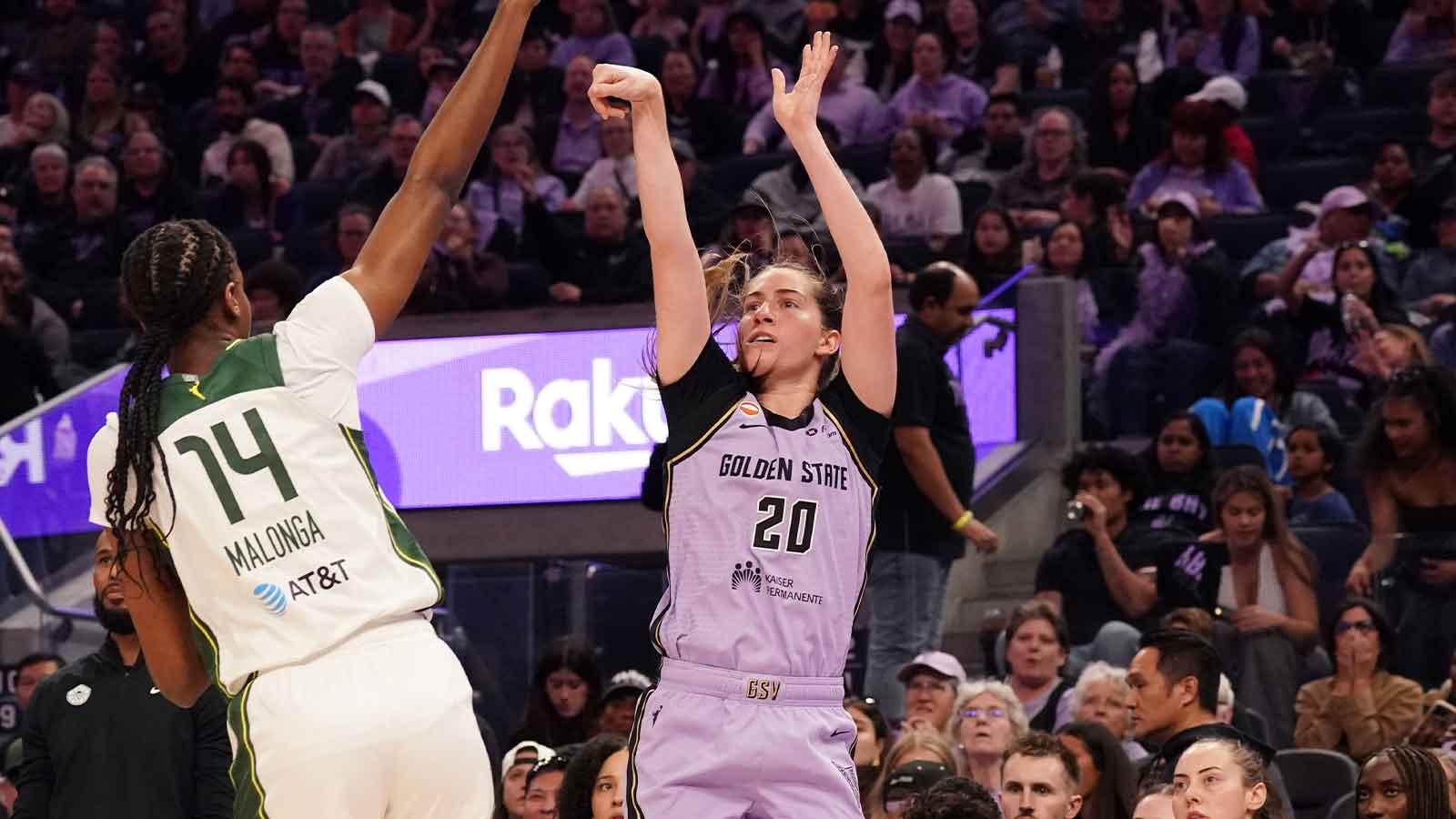 Golden State Valkyries guard Kate Martin (20) shoots a jumpshot over Seattle Storm center Dominique Malonga (14) in the third quarter at Chase Center.