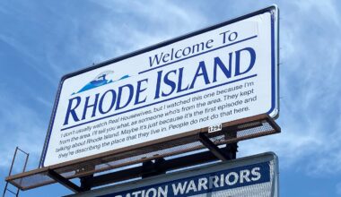 A "Welcome to Rhode Island" billboard featuring a Reddit comment about "The Real Housewives of Rhode Island" in downtown Providence is the work of Darian Newman, a graduate student at the Rhode Island School of Design.
