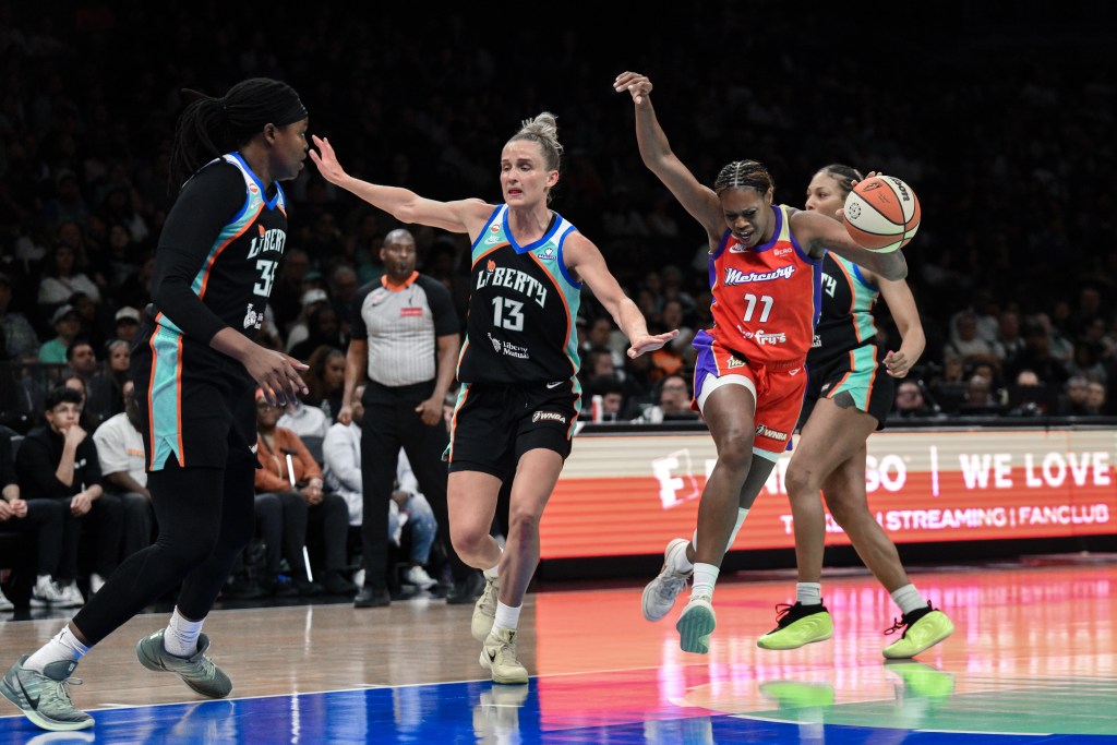 Leonie Fiebich (13) defends Marta Suarez (right) during the Liberty's 84-74 win over the Mercury on May 27, 2026 at Barclays Center.