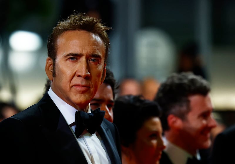 Nicolas Cage poses on the red carpet during arrivals for the screening of the film "The Surfer” in 2024.