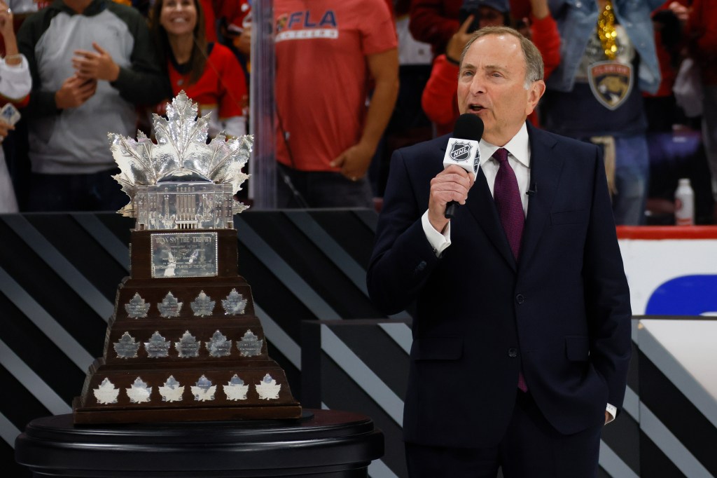 NHL Commissioner Gary Bettman presents the Conn Smythe Trophy