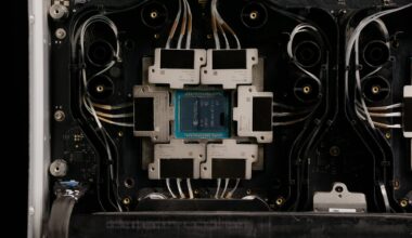 An NVIDIA chip labeled 'GH200 H100 NVL' is positioned centrally within a complex cooling system.