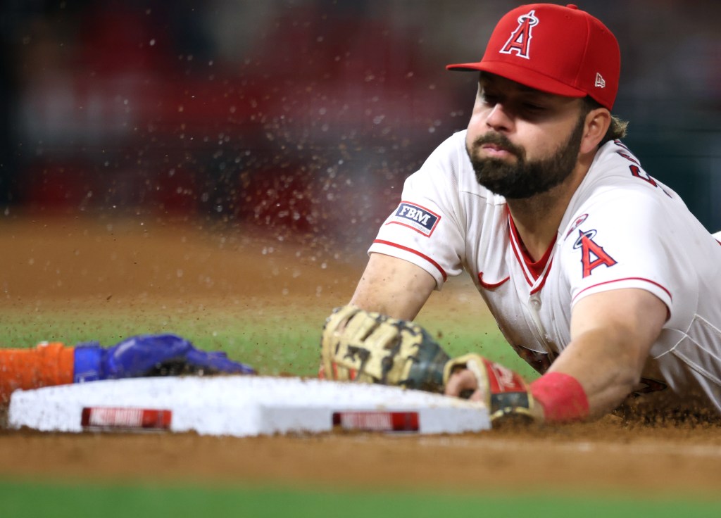 Nolan Schanuel dives to first after Ronny Mauricio dives safely into the base for an infield hit in the seventh inning of the Mets' 4-3, 10-inning loss to the Angels on May 2, 2026 in Anaheim, Calif. Unfortunately for the Mets, Mauricio fractured his left thumb and is headed to the IL.