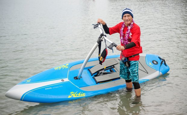 Mickey Munoz, of Capistrano Beach, shows off a Hobie Mirage Eclipse, a paddle board propelled by leg power, during the seventh Mickey Munoz Mongoose Cup in 2016. (File photo: Ken Steinhardt/SCNG)