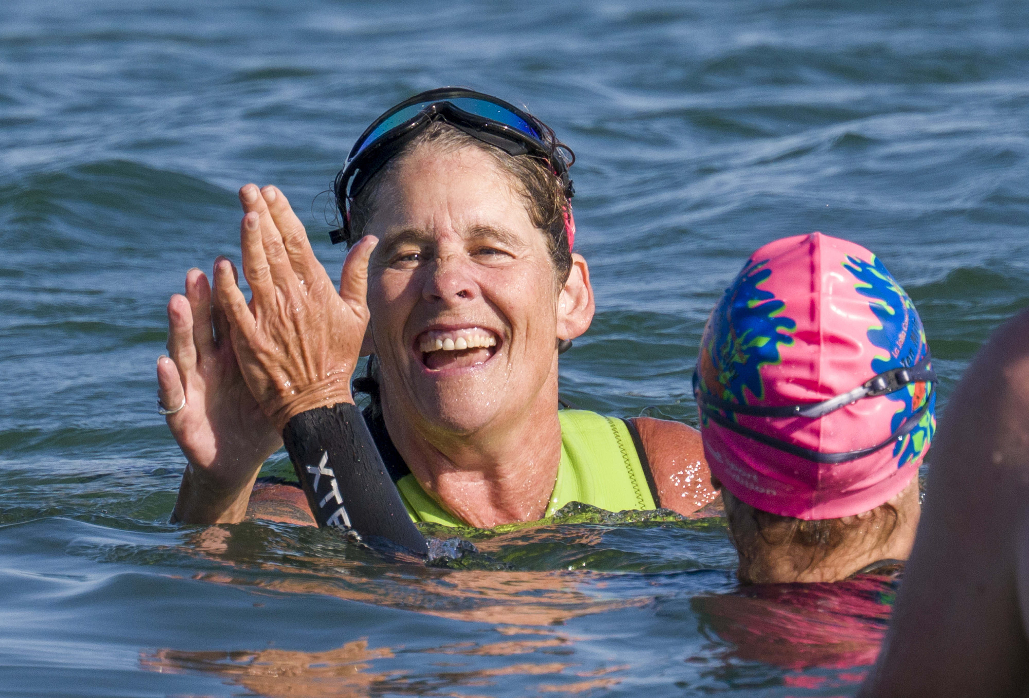 Maria Korcsmaros, left, gets a high-five from Val Bath after...