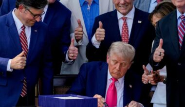 President Donald Trump signs the One Big Beautiful Bill Act at the White House on July 4 as House Speaker Mike Johnson and other Republicans look on. The law includes the creation of an IRA savings option for children.