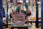 FILE — Manufacturing jobs have declined in the past year while hiring has grown in healthcare and social services. Nich Chen, works at ESS, Inc., in Wilsonville, in this Feb. 1, 2023 file photo. ESS manufactures iron flow batteries used for long-duration storage.