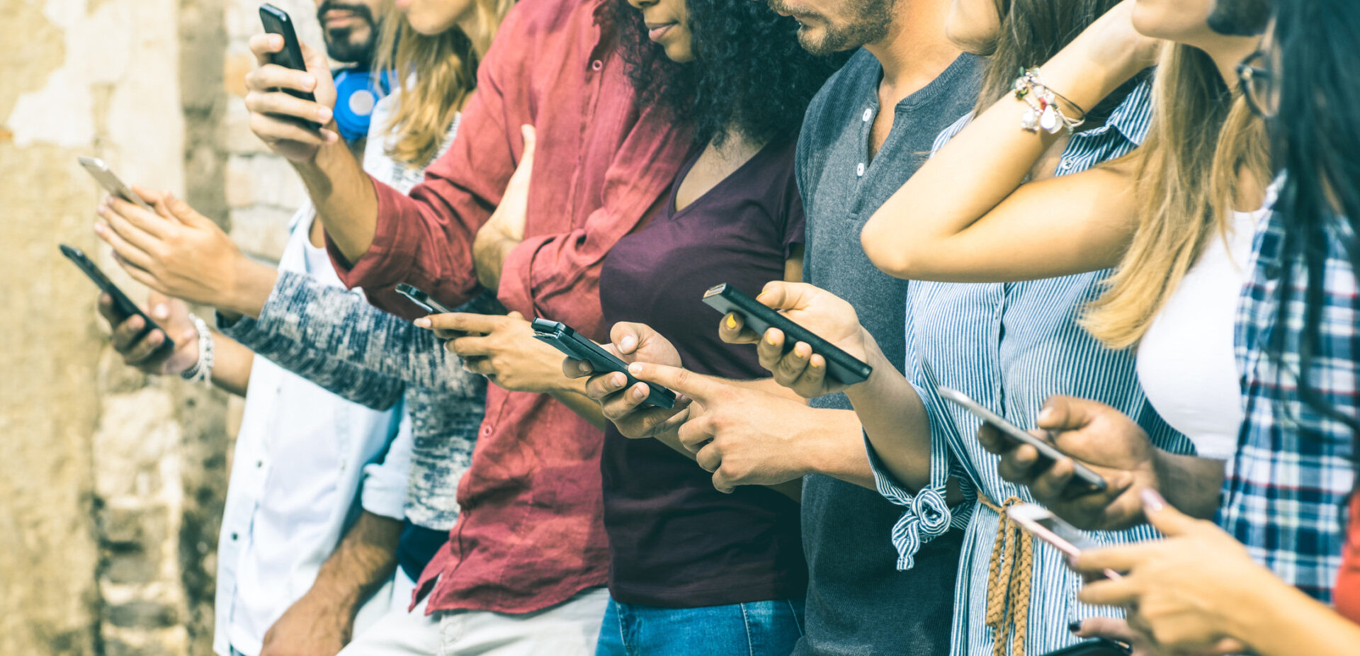 people looking at phones