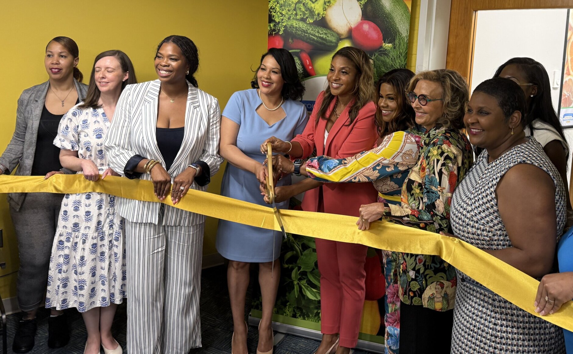 Cutting the ribbon at the Goodr Free Grocery Store