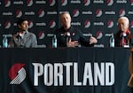 (Left to right) The new owners of the Portland Trailblazers, Sheel Tyle, Tom Dundon, and Andrew Cherng, make their first appearance at the Moda Center on April 2, 2026. 