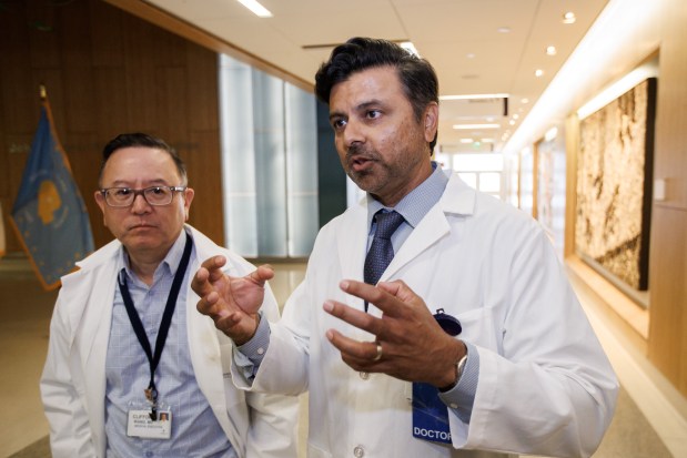 Santa Clara Valley Medical Center Medical Director Sanjay Kurani, right, speaks during an interview following a news conference by Santa Clara County Executive James Williams on the proposed county budget Friday, May 1, 2026, at the hospital in San Jose, Calif. (Dai Sugano/Bay Area News Group)