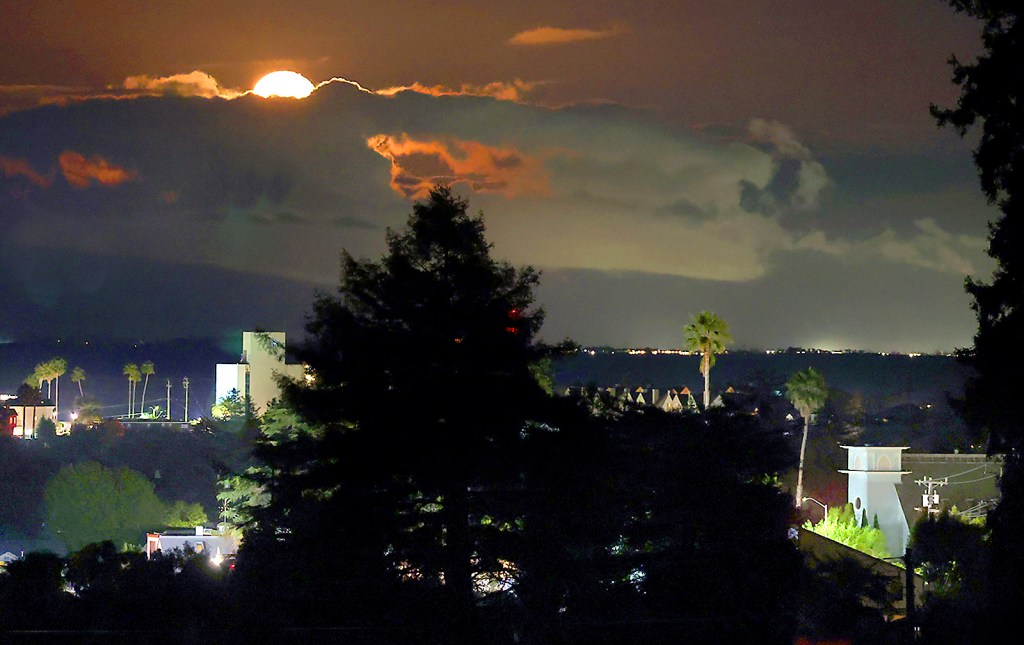 Moon rises through cloudbank above Santa Cruz – Santa Cruz Sentinel