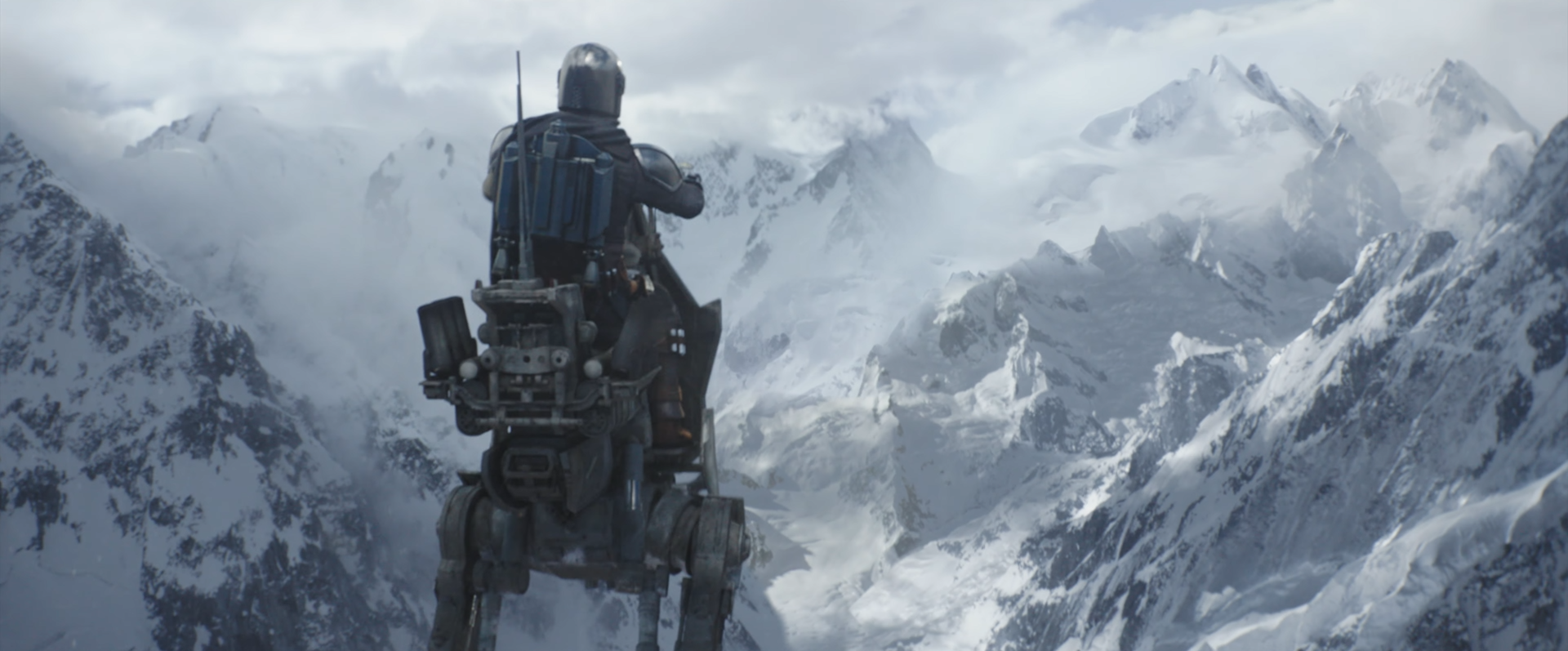 The Mandalorian and Grogu riding an AT-RT