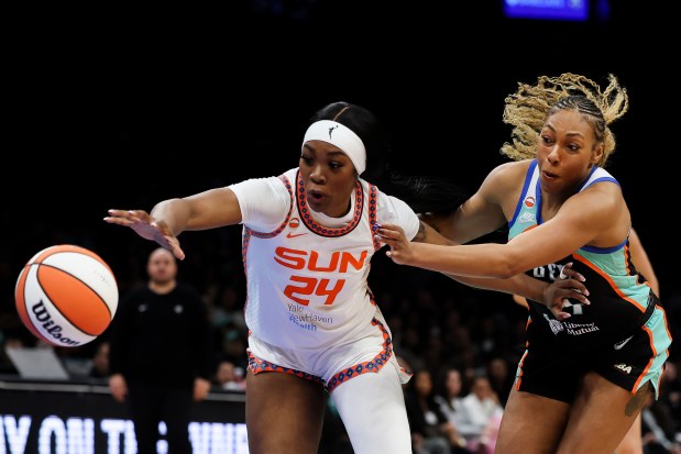 Aneesah Morrow #24 of the Connecticut Sun reaches for the ball against Betnijah Laney-Hamilton #44 of the New York Liberty during the first quarter of the season opener at Barclays Center on May 08, 2026 in the Brooklyn borough of New York City. NOTE TO USER: User expressly acknowledges and agrees that, by downloading and or using this photograph, User is consenting to the terms and conditions of the Getty Images License Agreement. (Photo by Ishika Samant/Getty Images)